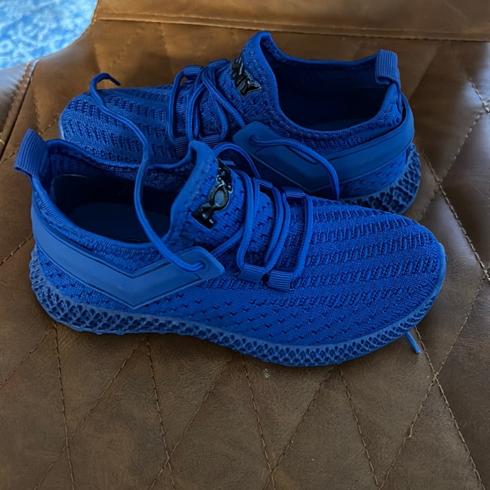 Pony brand boys shoes. Never worn brand new.